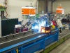 Automatic welding stand for center sill and I beam welding