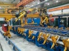 Robotic center for metro car roof welding