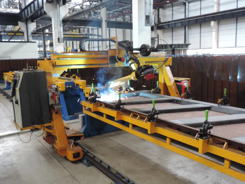 Robotic center for dumper side boards assembly and welding Techvagonmash