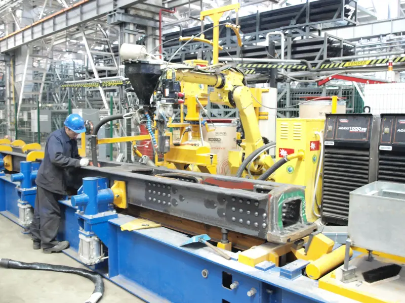 Production line for logitudinal welding of hatch gondola car center sill