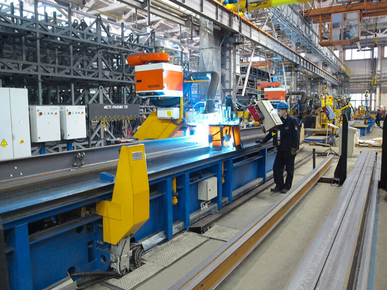Automatic welding stand for center sill and I beam welding