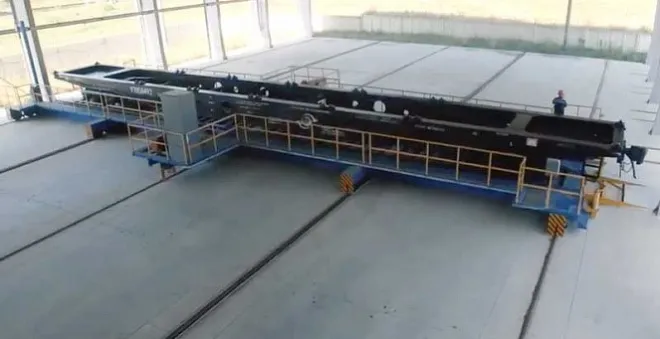 Rail transfer table for for moving freight cars