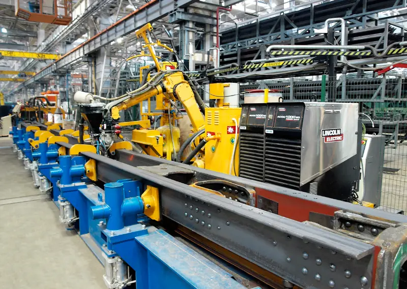 Production line for logitudinal welding of hatch gondola car center sill