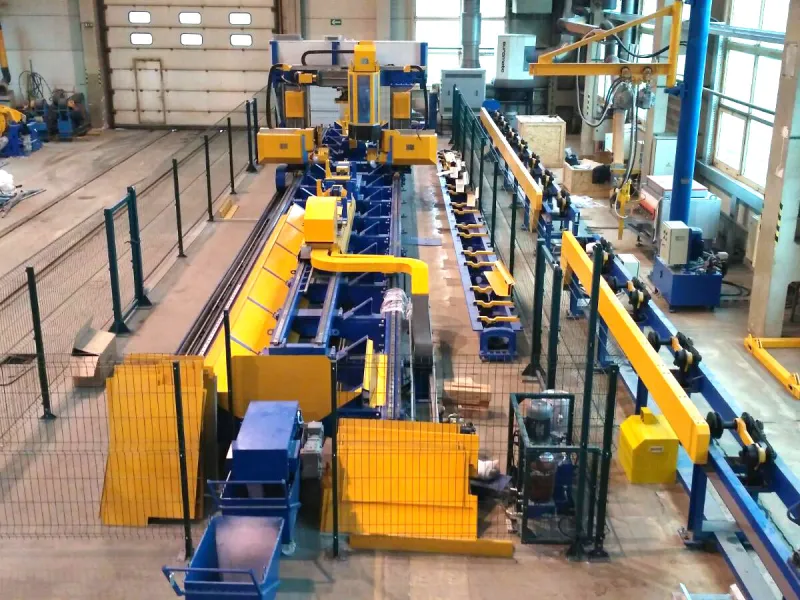 Automated drilling center for freight cars center sills