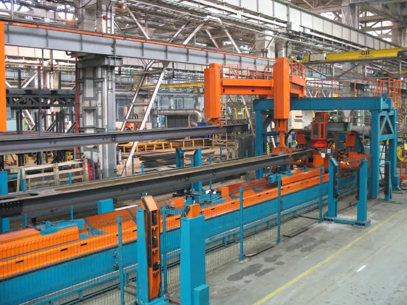 Automated centre sill drilling system for freight railcars (2 portals)