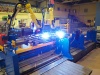 Robotic center for assembly and welding of roll container walls
