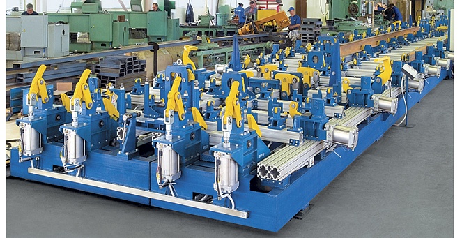 Universal welding machine for automatic welding of metal section on the car roof