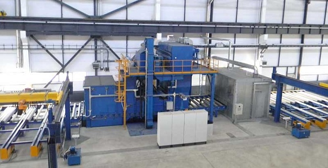 Shot blasting machine with pre-drying chamber