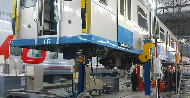 Railway lifting jacks for passenger coaches
